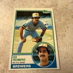 Topps Ed Romero Baseball Card with Orange and Black Accents